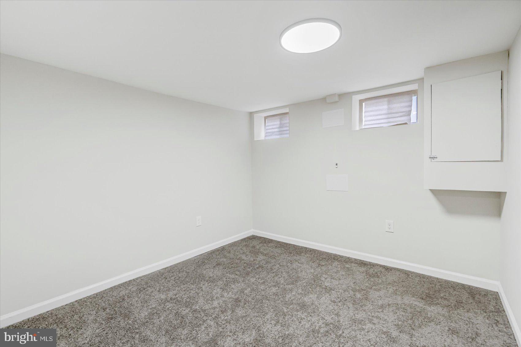 1743 Federal Street Baltimore, MD 21213 - Photo 30 of 47 an empty room with windows