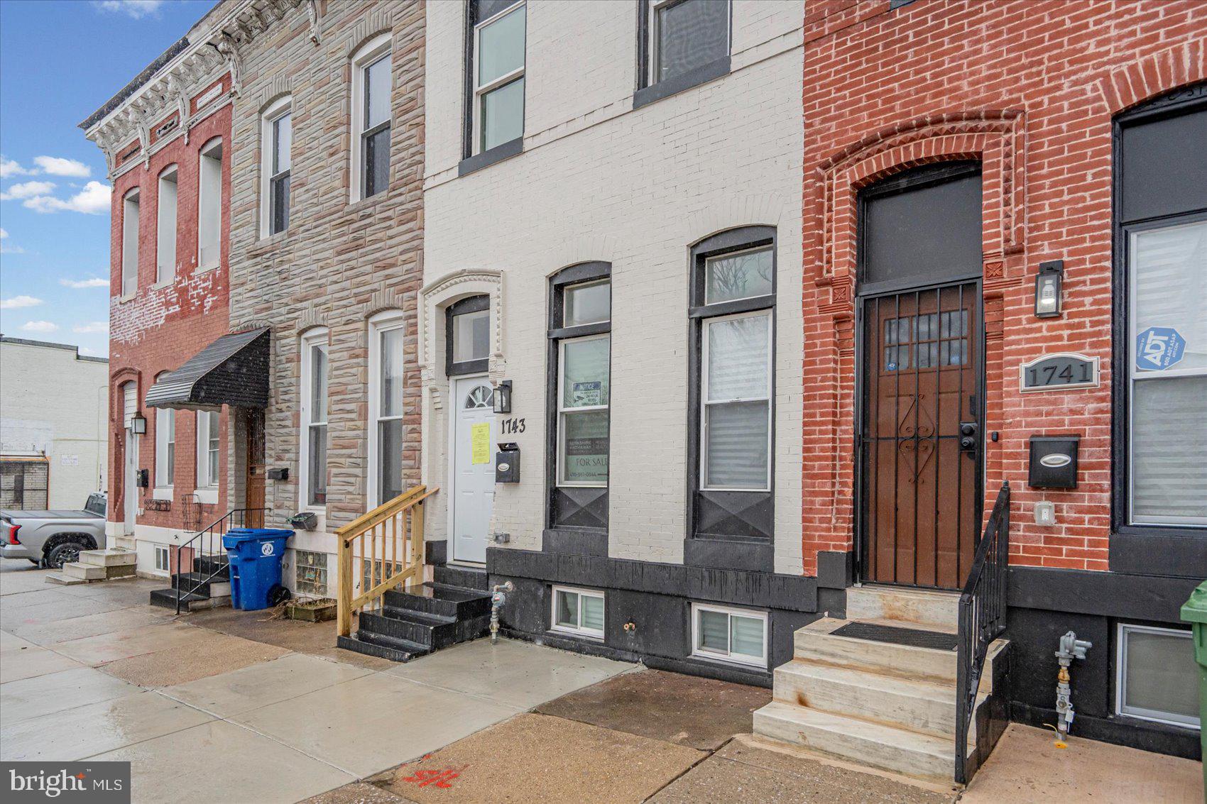 1743 Federal Street Baltimore, MD 21213 - Photo 42 of 47 a view of a brick building with many windows