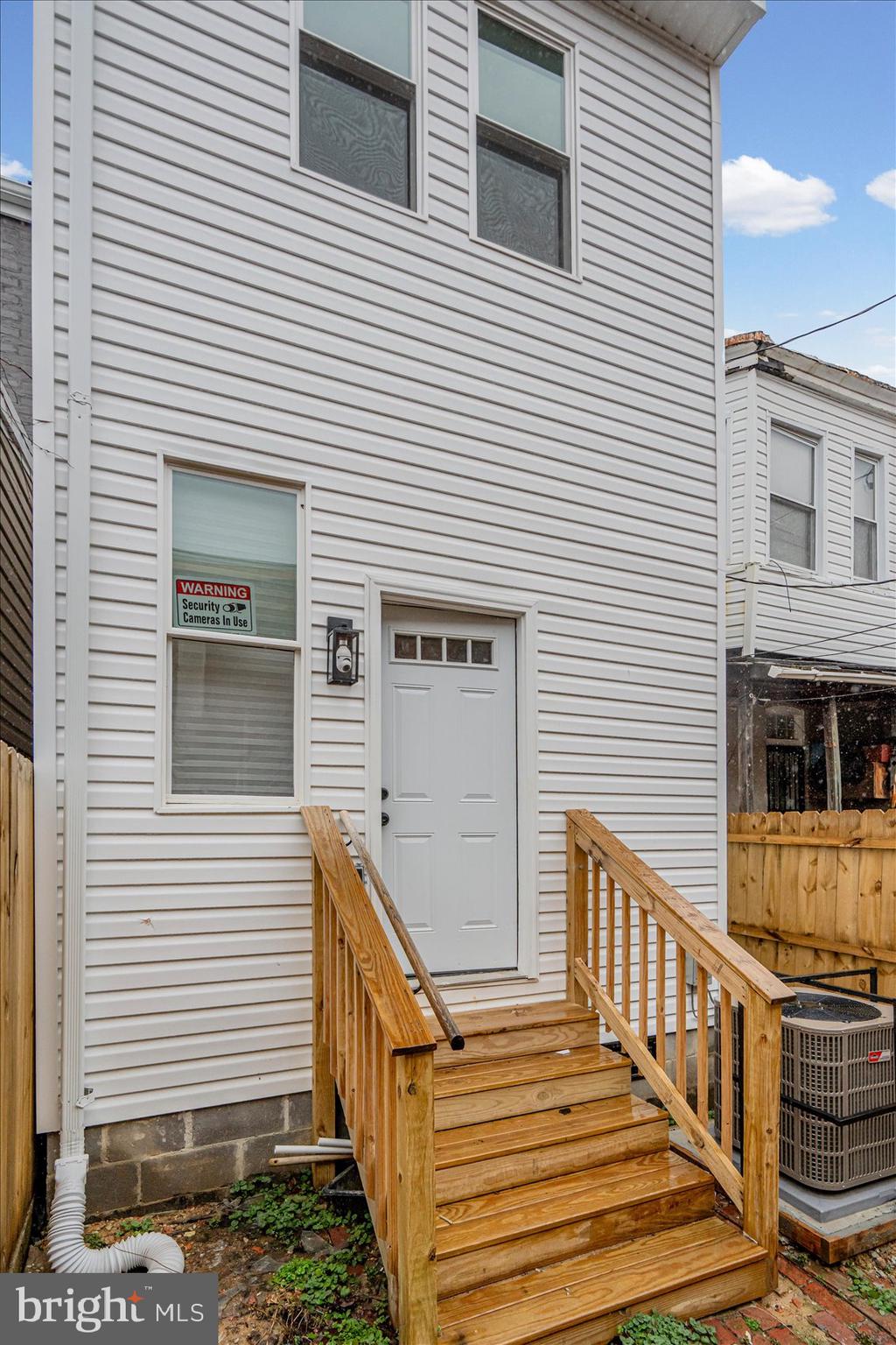 1743 Federal Street Baltimore, MD 21213 - Photo 44 of 47 a view of a house with wooden stairs