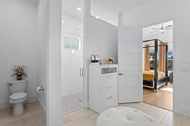a view of a balcony dining space with furniture