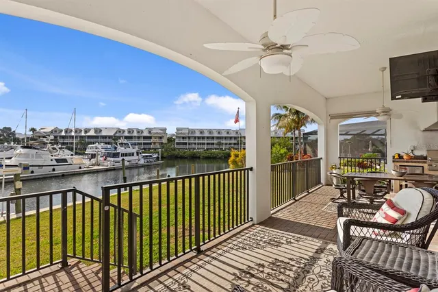 a bathroom with a double vanity sink mirror and toilet
