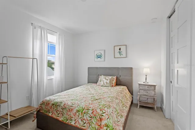 a view of a patio with couches and a table and chairs