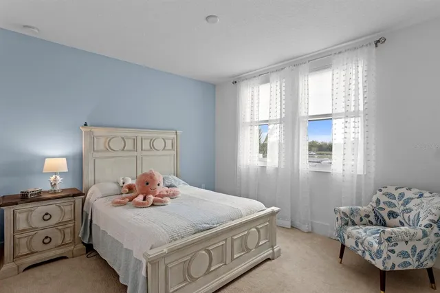 a view of a chairs and table in the patio