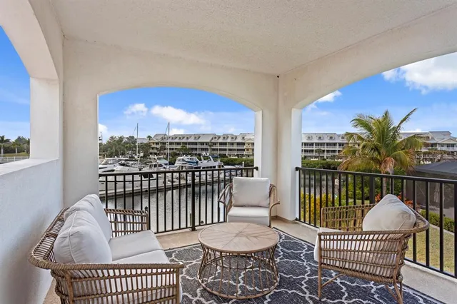 a view of a chairs and table in wooden roof