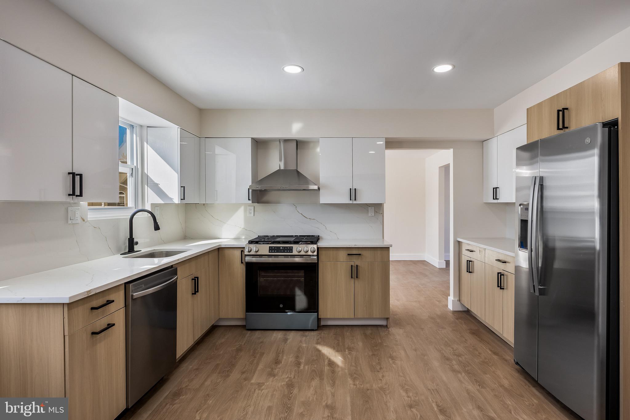 22 Willow Ridge Road Marlton, NJ 08053 - Photo 12 of 29 a kitchen with stainless steel appliances granite countertop a sink stove and refrigerator
