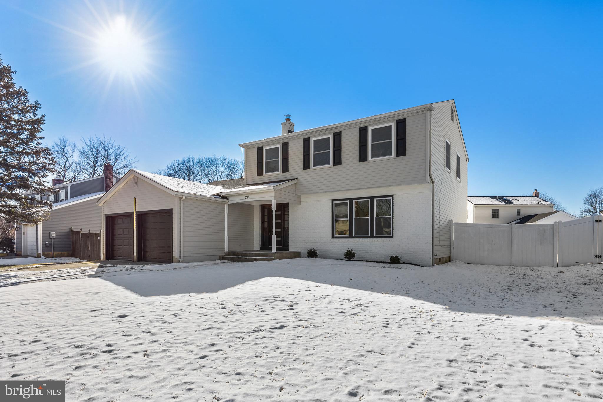 22 Willow Ridge Road Marlton, NJ 08053 - Photo 2 of 29 a view of a house with a yard covered in snow
