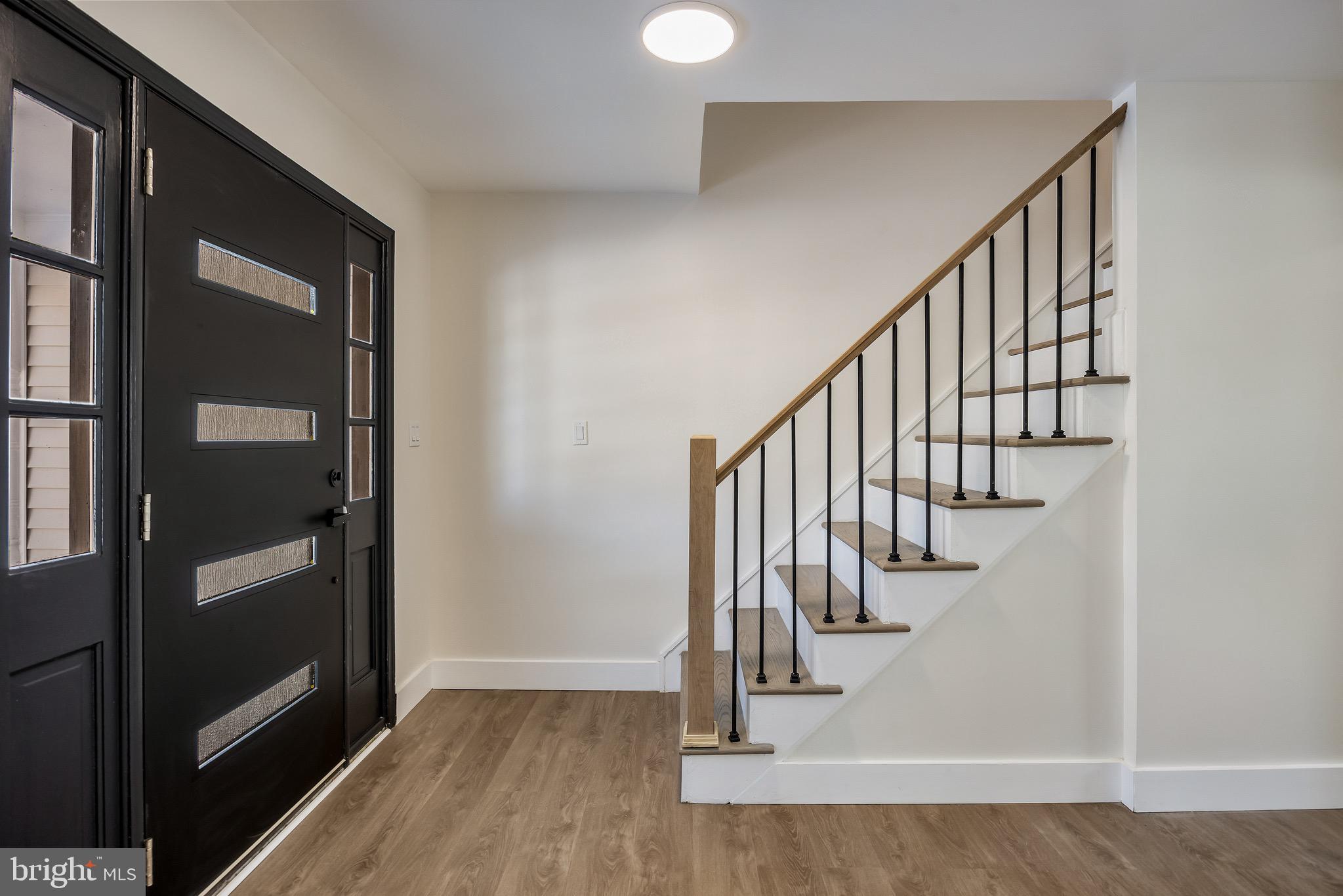 22 Willow Ridge Road Marlton, NJ 08053 - Photo 4 of 29 a view of entryway with wooden floor and stairs