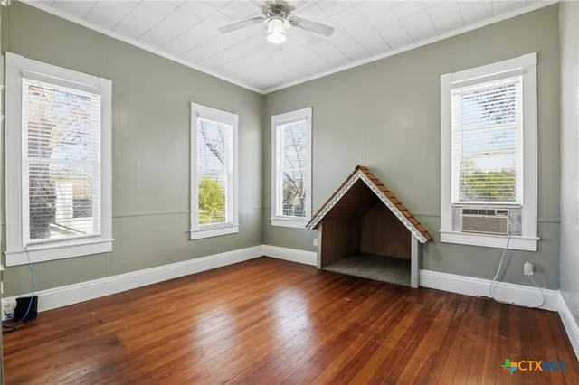 a house with trees in front of it