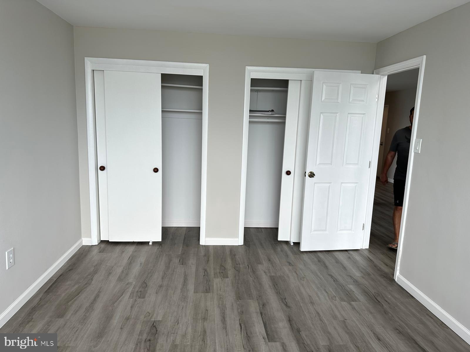 4401 Cherry Hill Road, Unit 67 Arlington, VA 22207 - Photo 22 of 23 an empty room with wooden floor and a sink