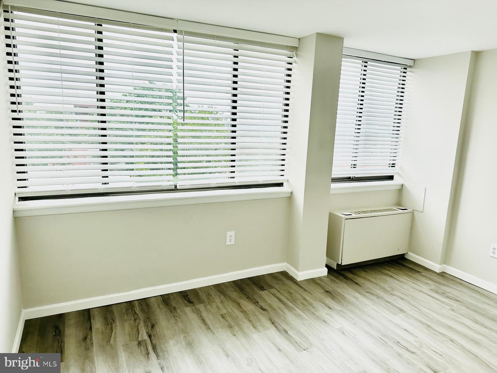 4401 Cherry Hill Road, Unit 67 Arlington, VA 22207 - Photo 4 of 23 a view of a room with a window and wooden floor