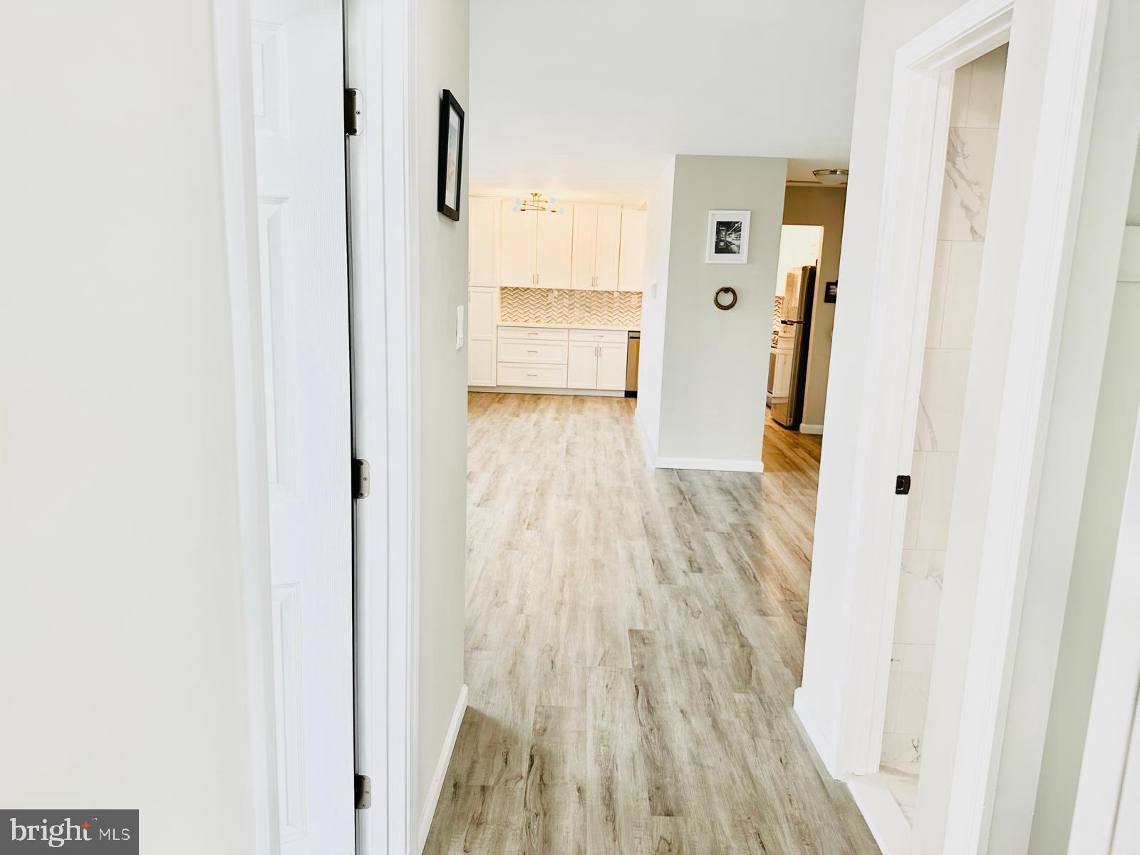 4401 Cherry Hill Road, Unit 67 Arlington, VA 22207 - Photo 5 of 23 a view of a hallway with wooden floor and closet