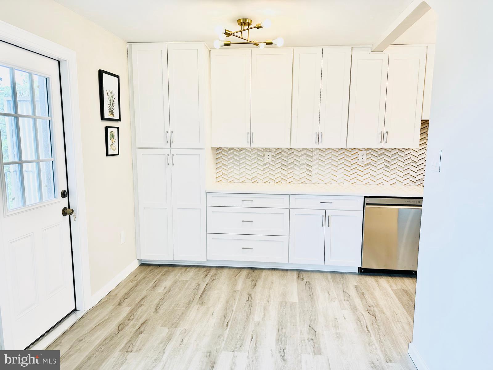 4401 Cherry Hill Road, Unit 67 Arlington, VA 22207 - Photo 8 of 23 a view of a kitchen with wooden floor