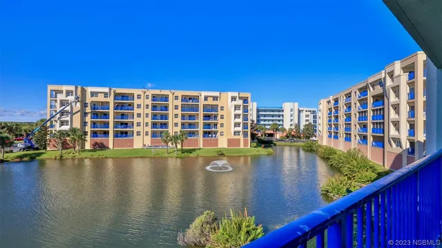a view of swimming pool from a balcony
