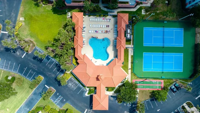 an aerial view of a house with a garden