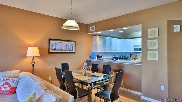 a view of a dining room with furniture