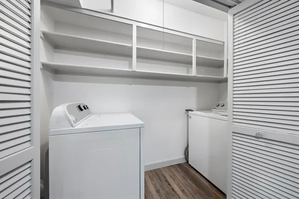 a utility room with dryer and washer