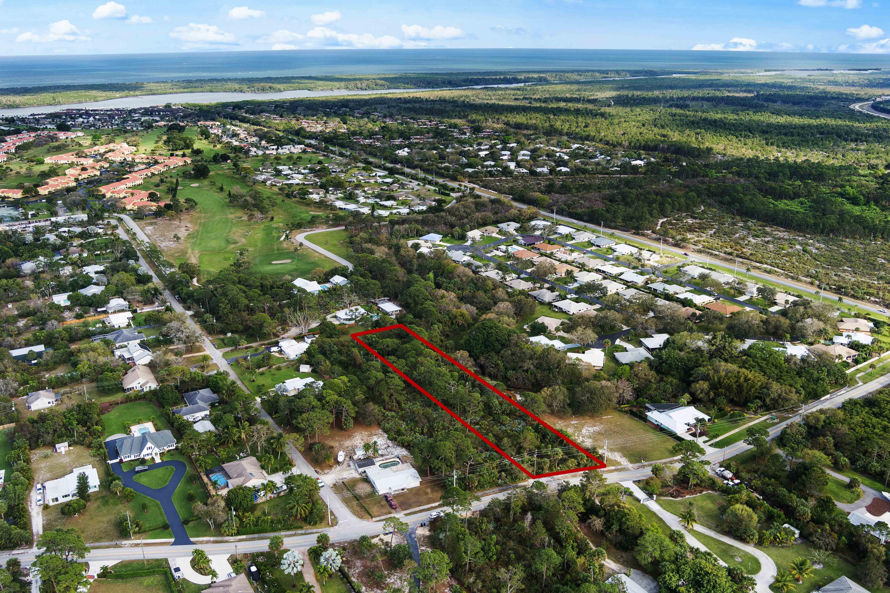 4975 Southeast Manatee Cove Road Stuart, FL 34997 - Photo 4 of 7 3. 3rd Drone Shot w. Border