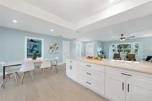 a room with lot of furniture and window