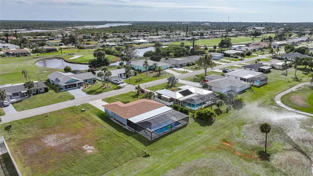 an aerial view of a house with a outdoor space