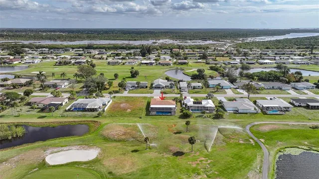 a view of a lake with a city