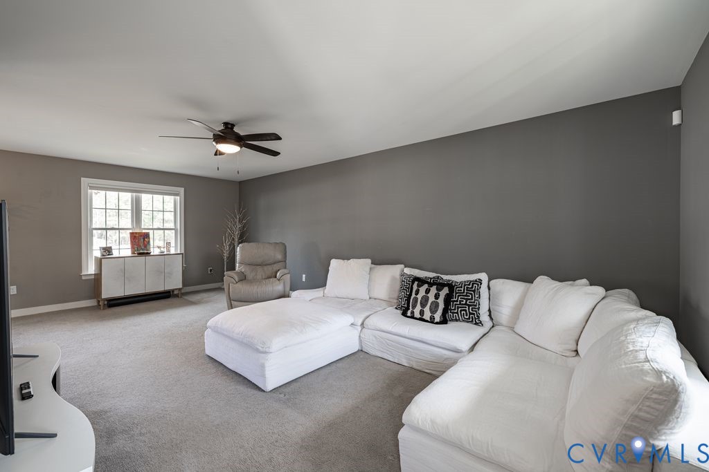 241 Pleasant View Drive Aylett, VA 23009 - Photo 23 of 36 a living room with furniture and a window