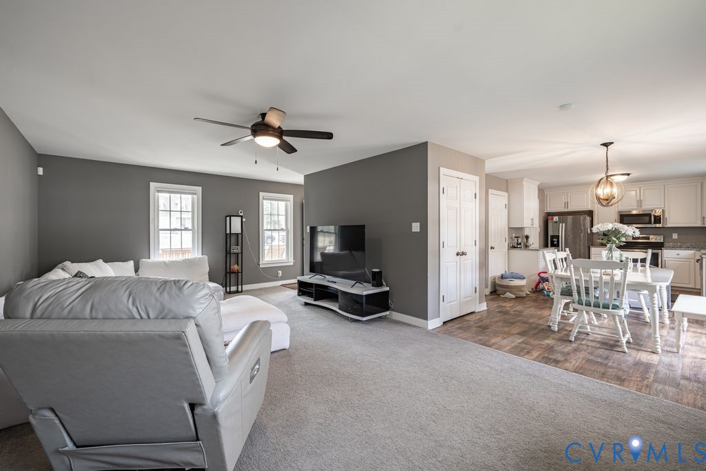 241 Pleasant View Drive Aylett, VA 23009 - Photo 25 of 36 a living room with furniture and a flat screen tv