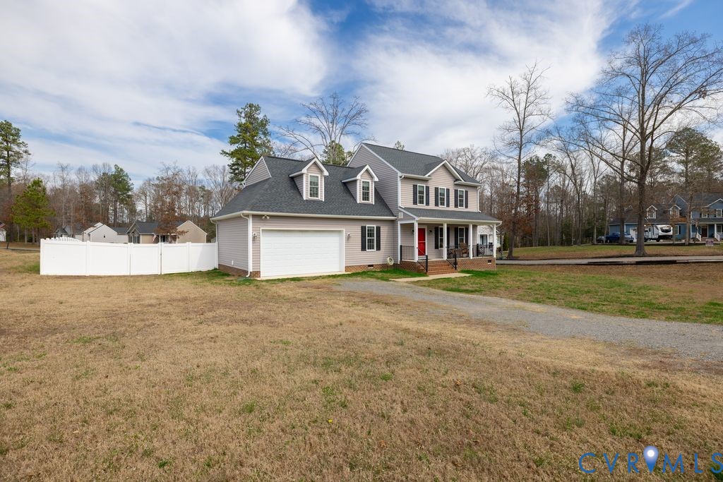241 Pleasant View Drive Aylett, VA 23009 - Photo 3 of 36 a front view of a house with a yard