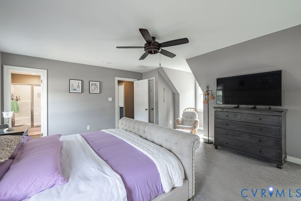 241 Pleasant View Drive Aylett, VA 23009 - Photo 31 of 36 a bedroom with a bed and a flat screen tv