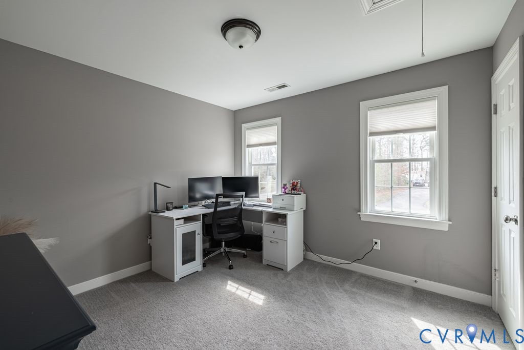 241 Pleasant View Drive Aylett, VA 23009 - Photo 35 of 36 a view of a workspace with furniture and a window