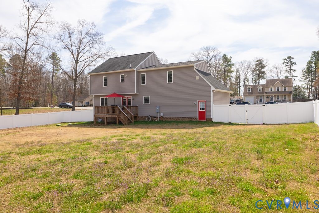 241 Pleasant View Drive Aylett, VA 23009 - Photo 6 of 36 a view of a house with backyard and trees