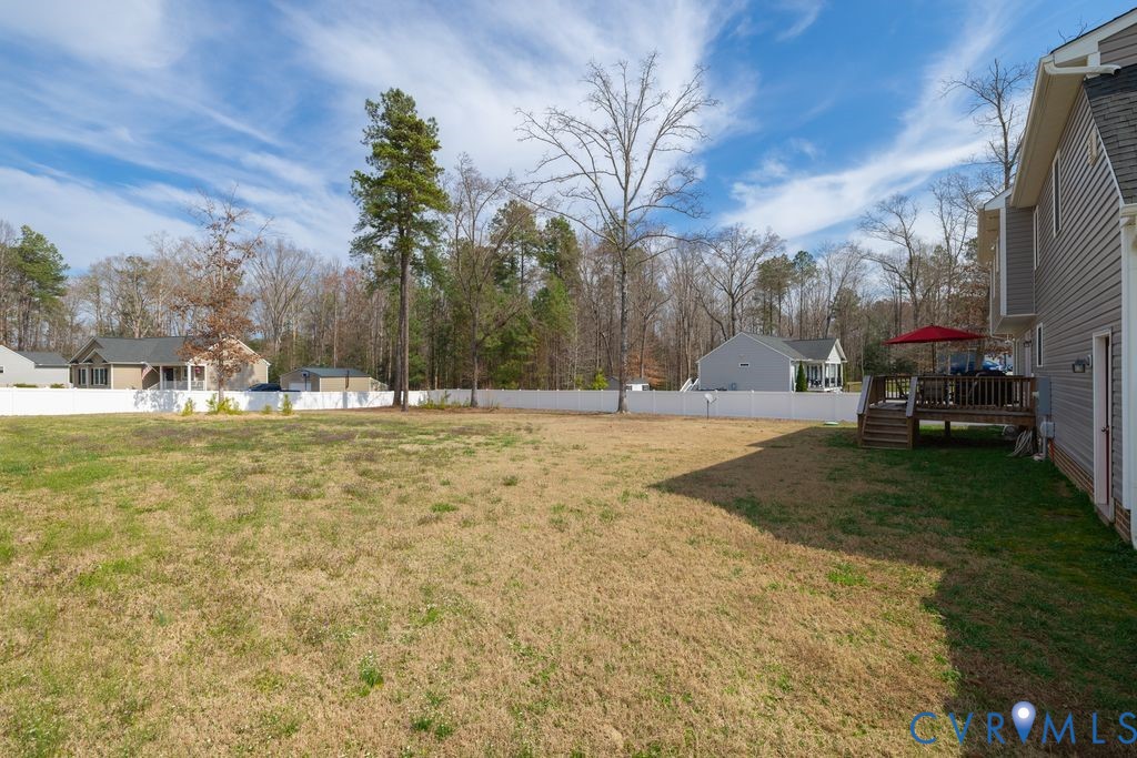 241 Pleasant View Drive Aylett, VA 23009 - Photo 8 of 36 a view of outdoor space with garden and trees