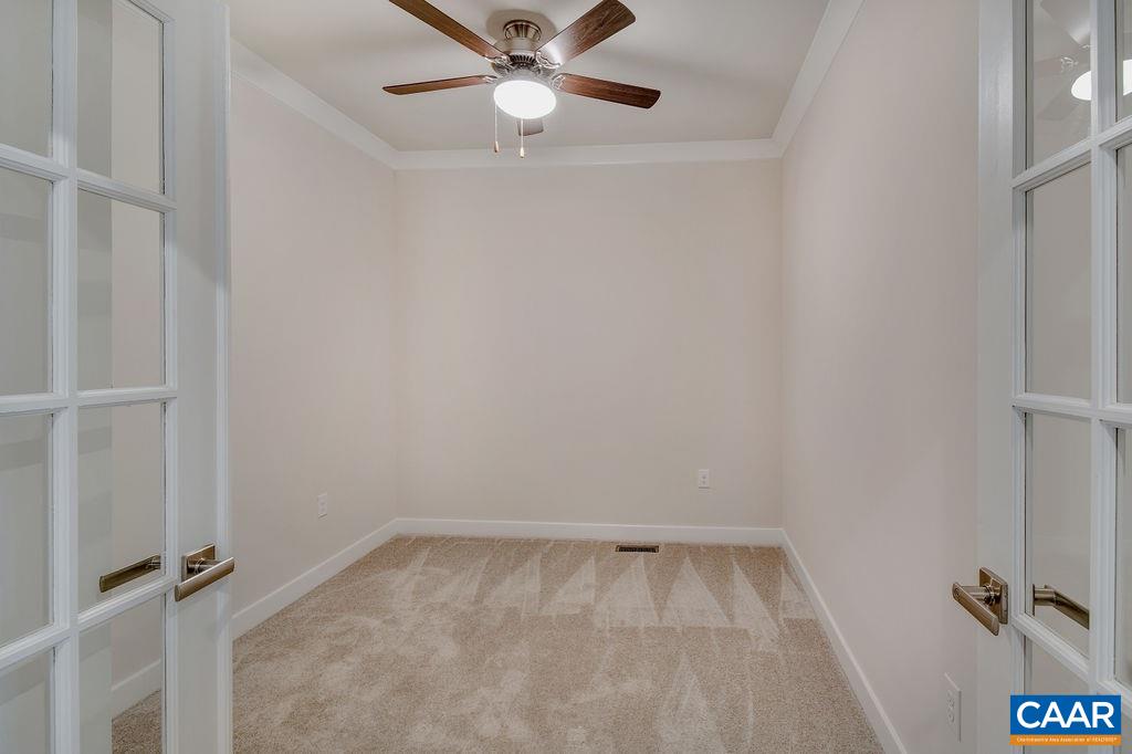 351 Winding Road Keswick, VA 22947 - Photo 14 of 21 an empty room with a window