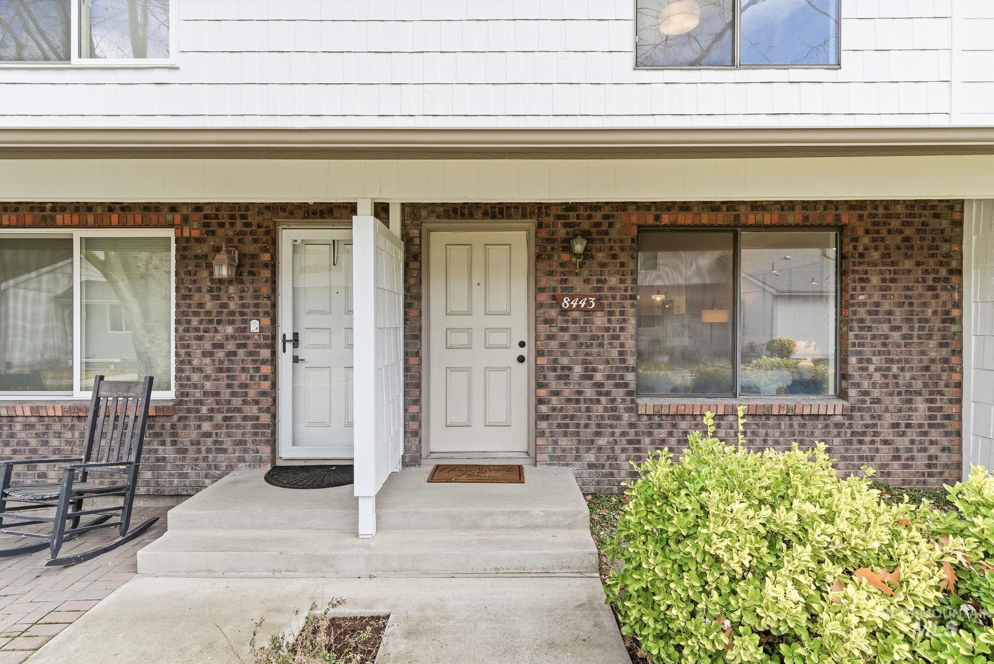 8443 West Rifleman Street Boise, ID 83704 - Photo 2 of 39 Property entrance with covered porch and brick siding