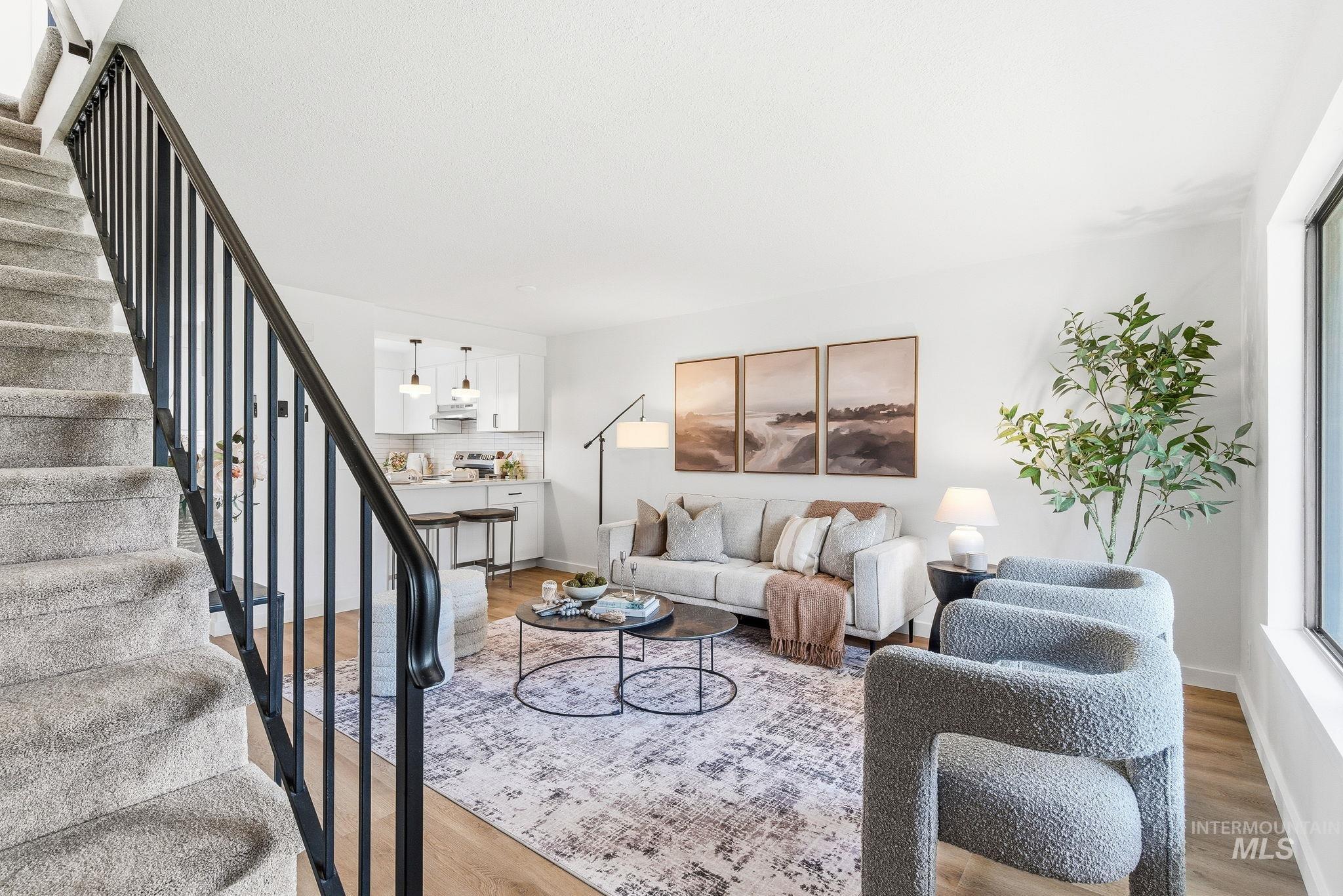 8443 West Rifleman Street Boise, ID 83704 - Photo 21 of 39 Living area featuring wood finished floors