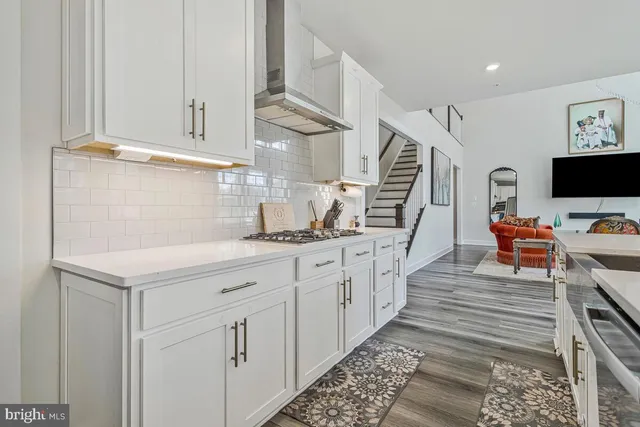 a spacious bedroom with a bed and window