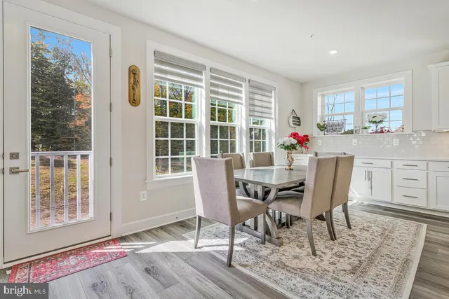 a spacious bedroom with a bed and furniture