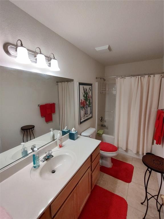 14191 Southwest 115th Terrace Dunnellon, FL 34432 - Photo 23 of 36 a bathroom with a sink and a mirror