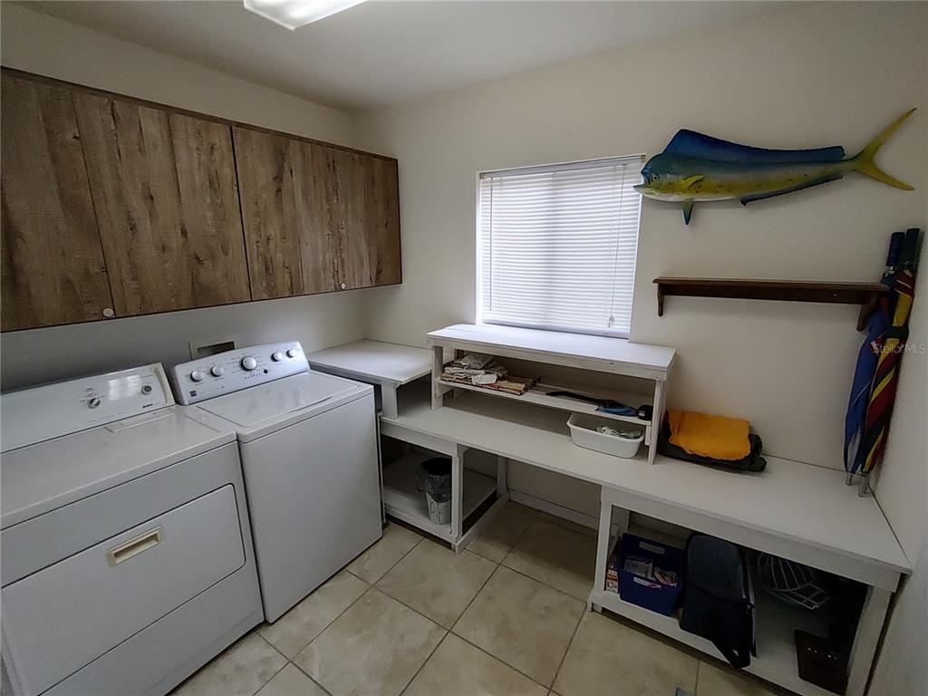 14191 Southwest 115th Terrace Dunnellon, FL 34432 - Photo 33 of 36 a utility room with dryer and washer