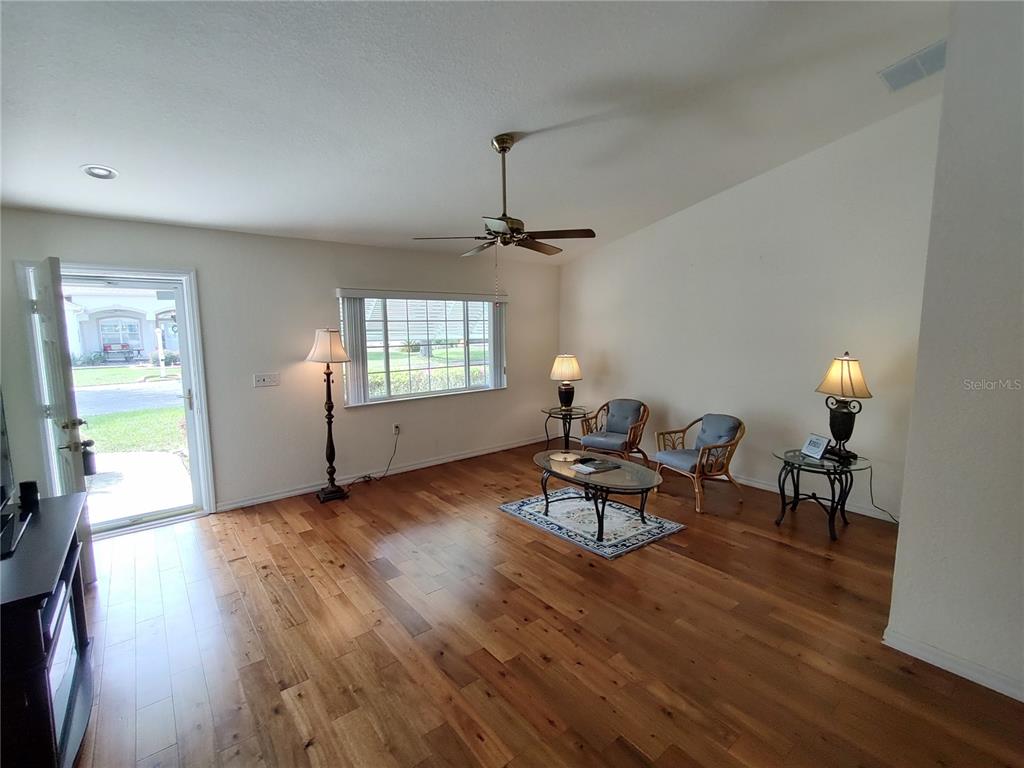14191 Southwest 115th Terrace Dunnellon, FL 34432 - Photo 5 of 36 a living room with furniture and a window