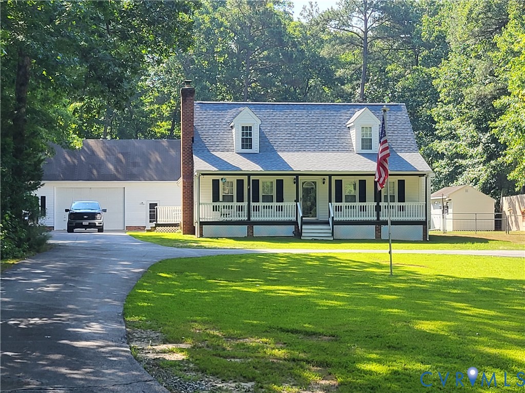 13521 Bailey Bridge Road Midlothian, VA 23112 - Photo 1 of 9 White Cape Cod style residence featuring a covered