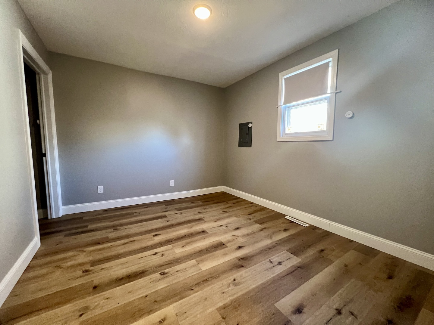 200 East South Street Ellsworth, IL 61737 - Photo 8 of 19 a view of empty room with wooden floor