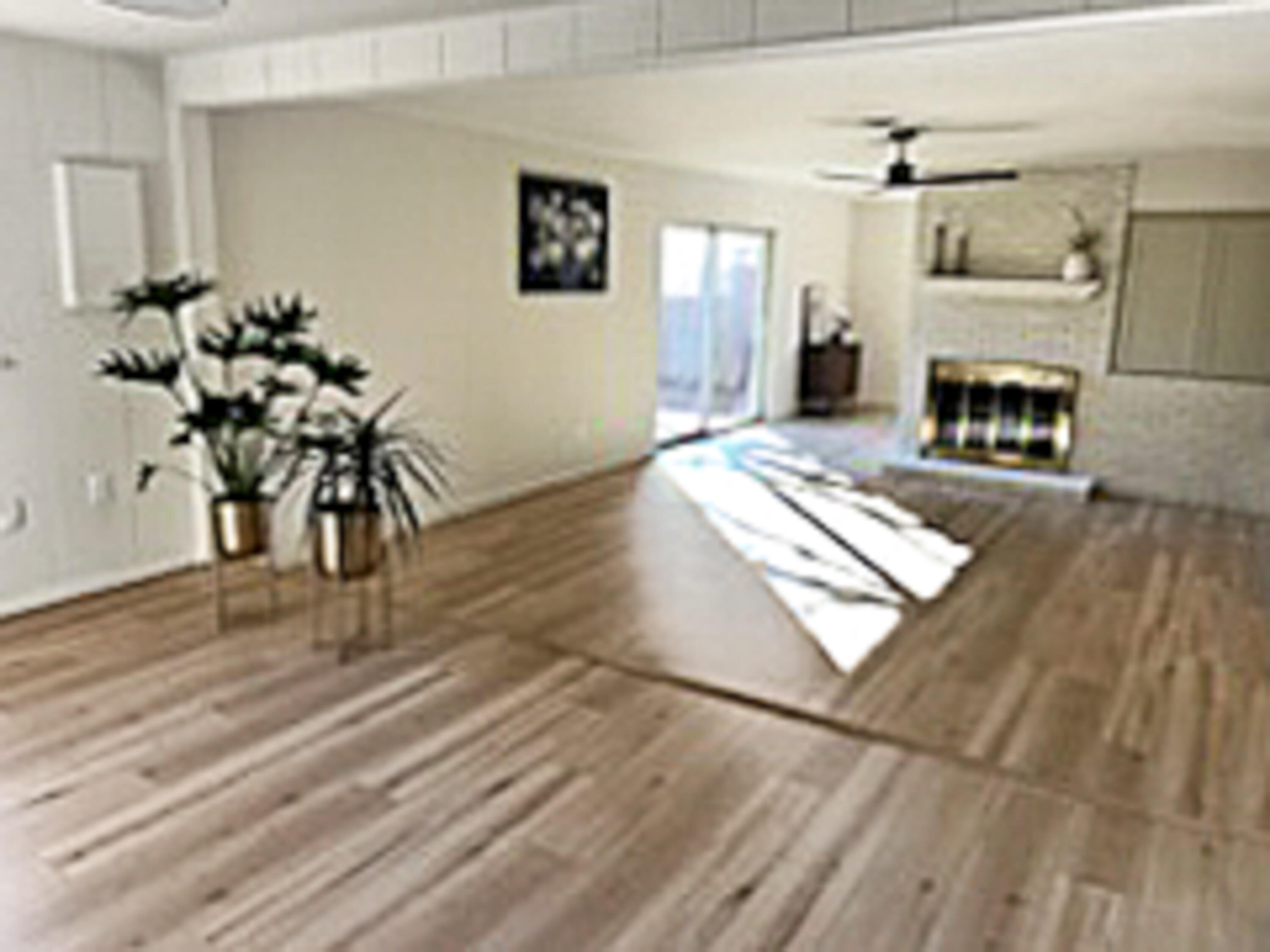 3625 59th Street Lubbock, TX 79413 - Photo 12 of 41 a living room with furniture and a fireplace