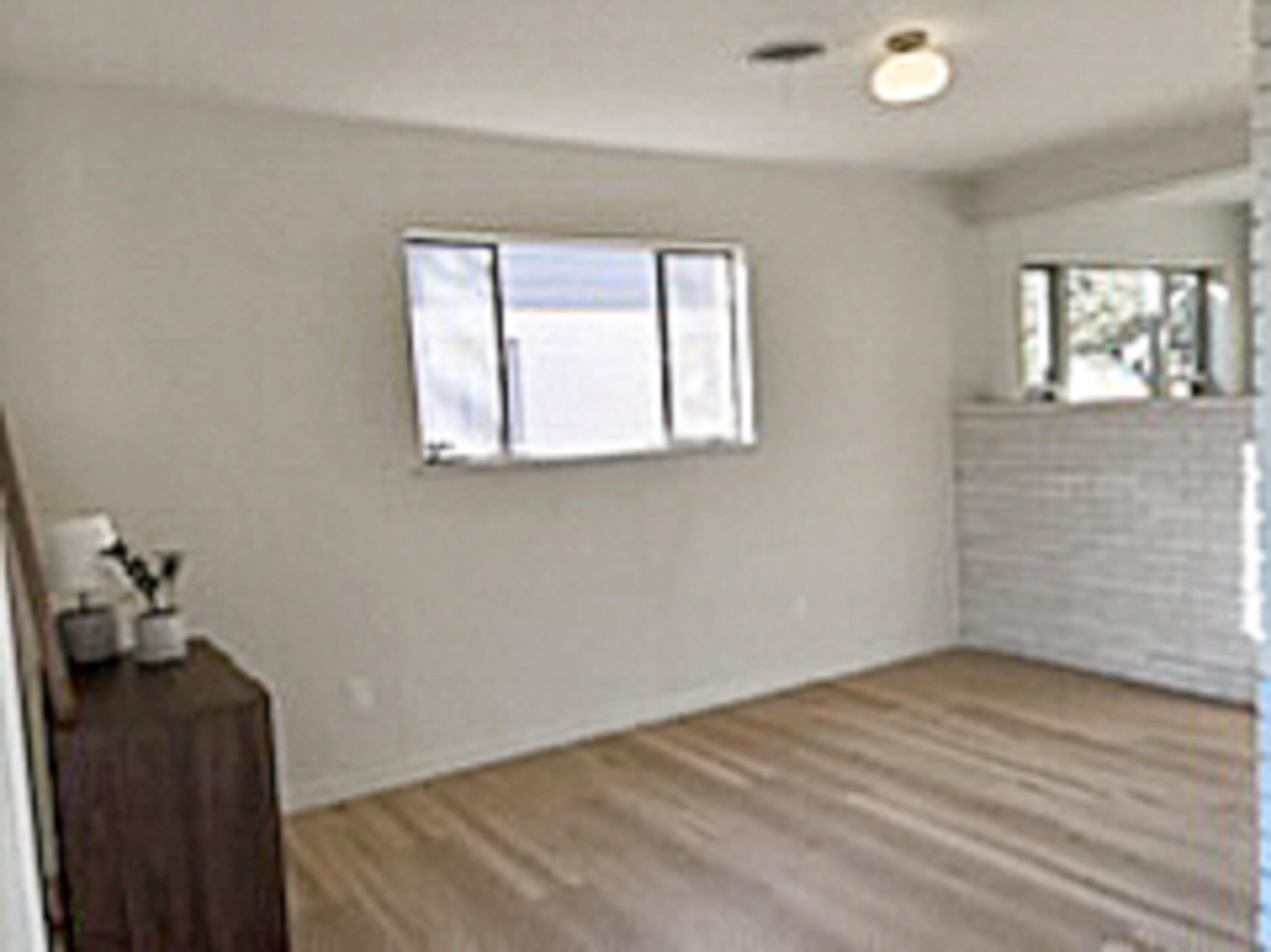 3625 59th Street Lubbock, TX 79413 - Photo 15 of 41 an empty room with windows