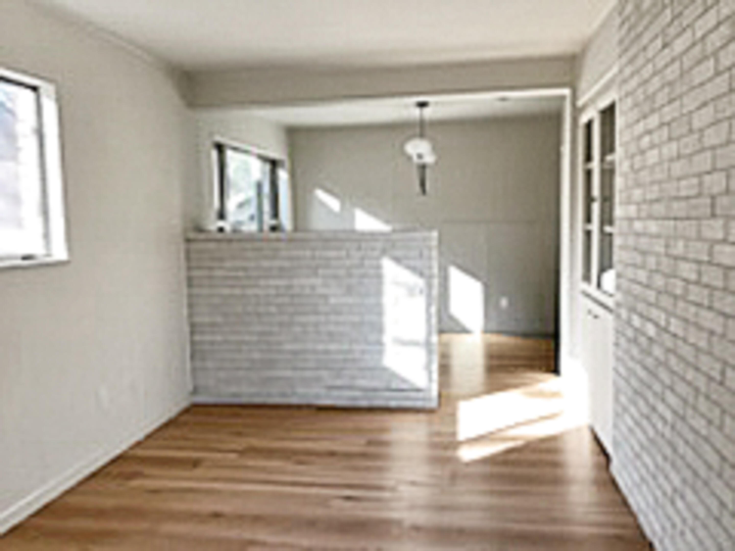 3625 59th Street Lubbock, TX 79413 - Photo 16 of 41 a view of empty room with wooden floor and fan