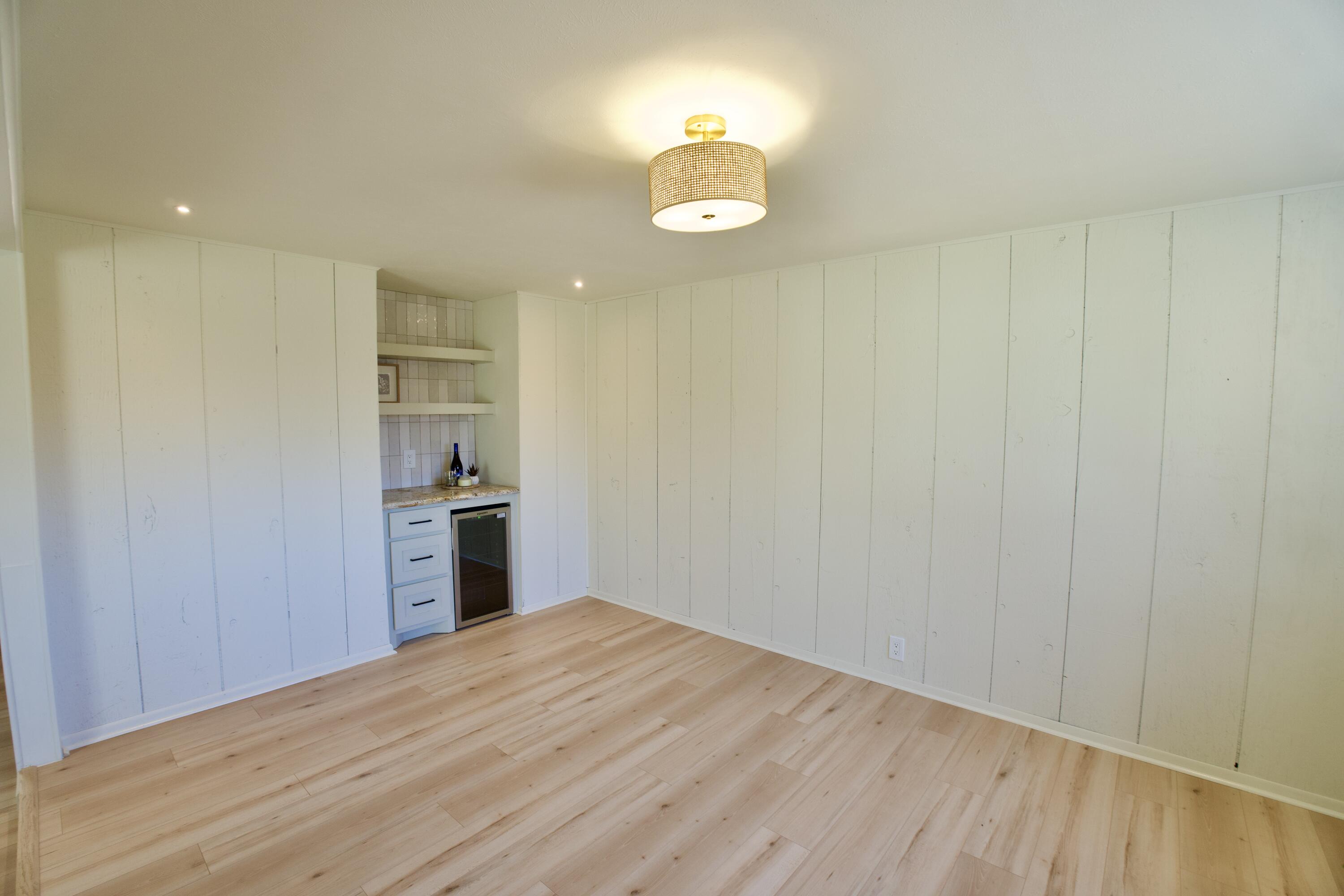 3625 59th Street Lubbock, TX 79413 - Photo 29 of 41 a kitchen with a refrigerator and a stove top oven