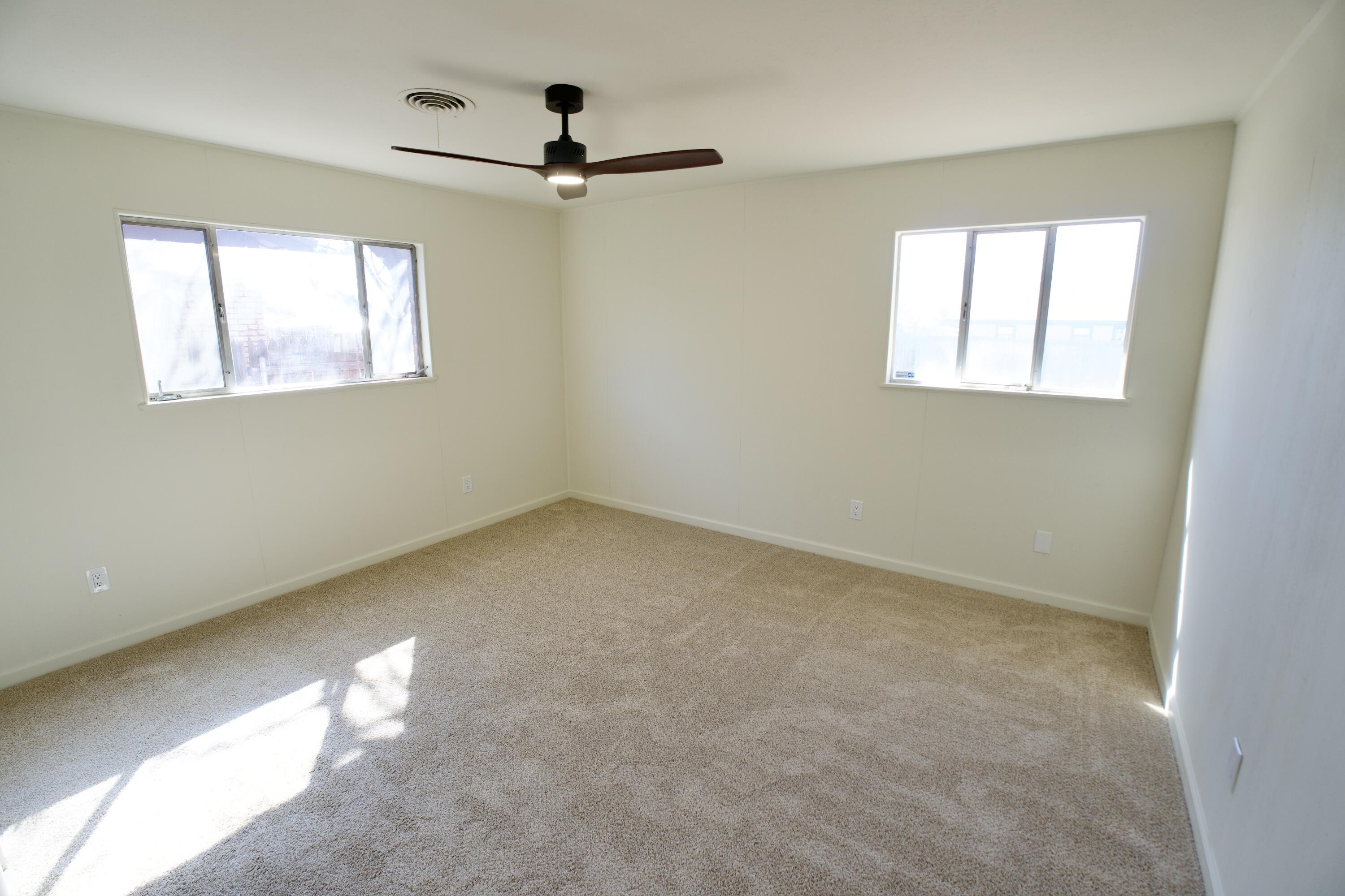 3625 59th Street Lubbock, TX 79413 - Photo 37 of 41 a view of empty room with windows