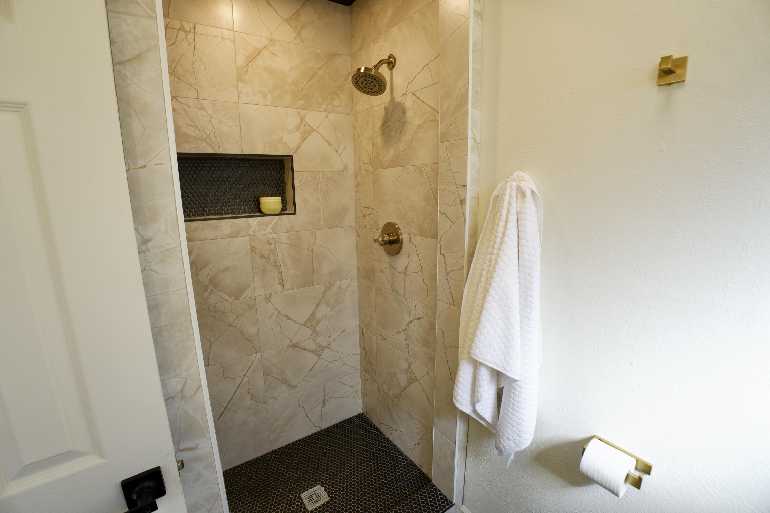 3625 59th Street Lubbock, TX 79413 - Photo 39 of 41 a bathroom with a shower