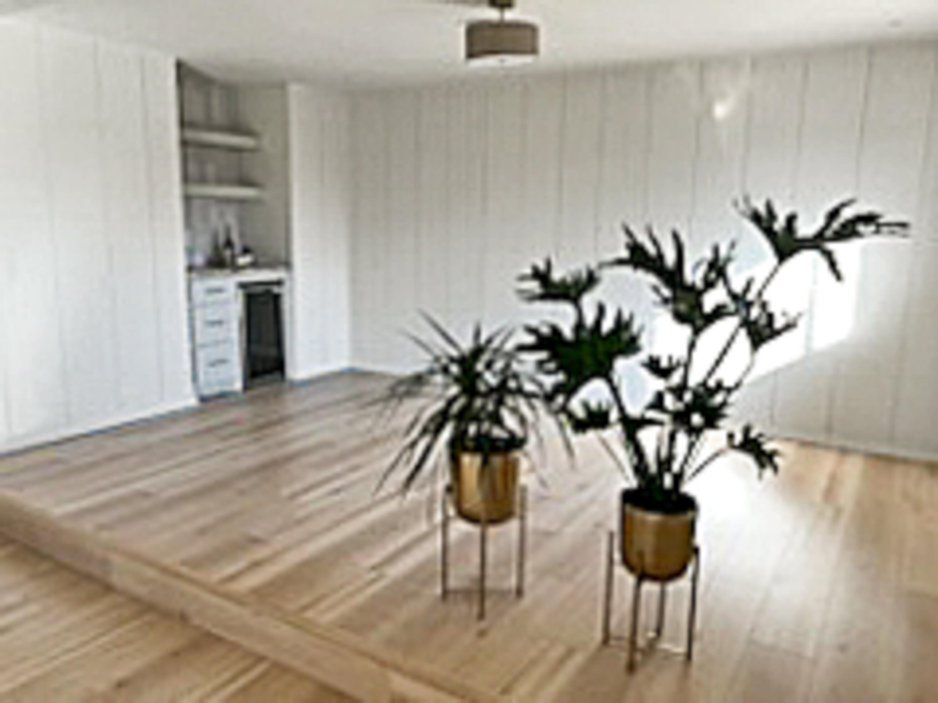 3625 59th Street Lubbock, TX 79413 - Photo 8 of 41 a vase of flowers sitting on a table in a room