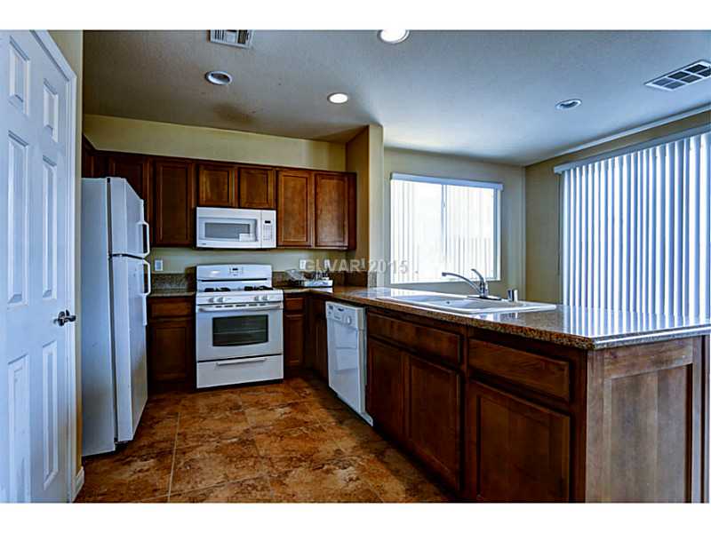 330 Fringe Ruff Drive Las Vegas, NV 89148 - Photo 5 of 23 Kitchen.