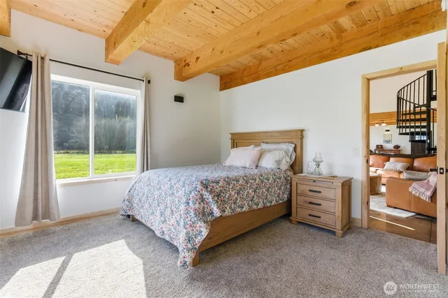 a bedroom with a bed and a cabinets